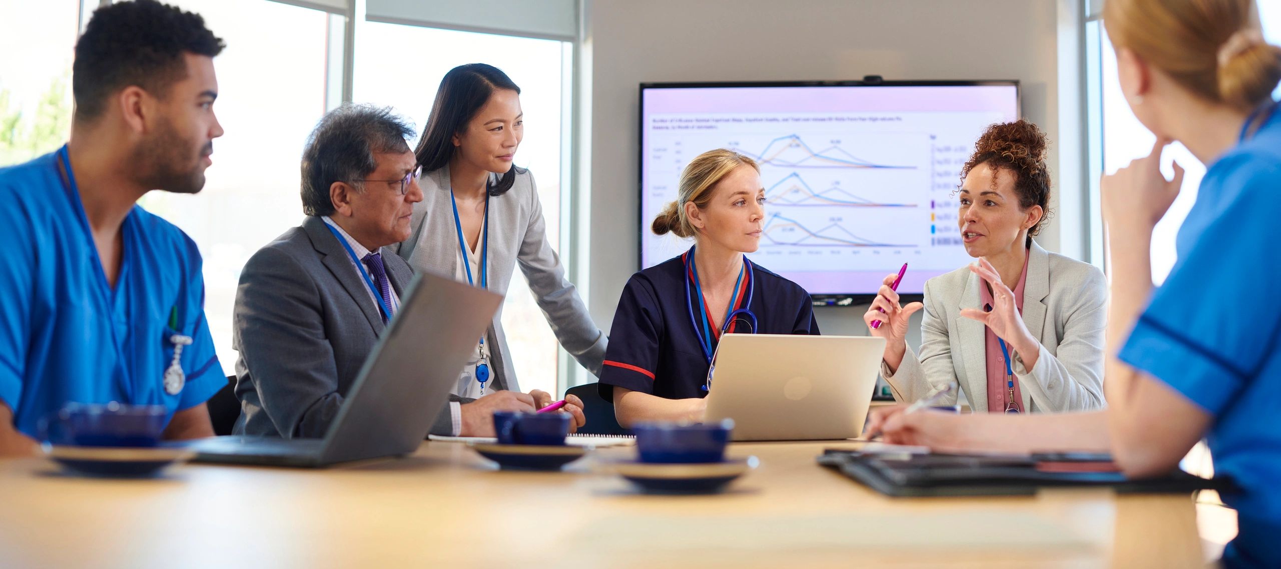 Custom AI workshop, hospital team training, healthcare professionals, modern, digital, collaborative