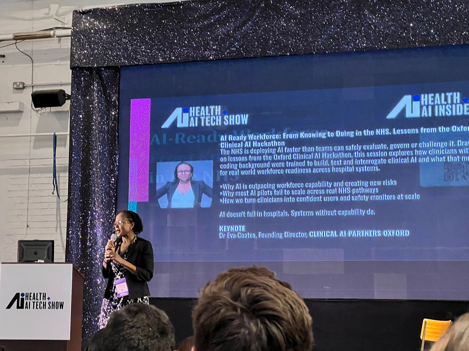 Dr Eva Coates delivering the keynote at the Health + AI Tech Show, London